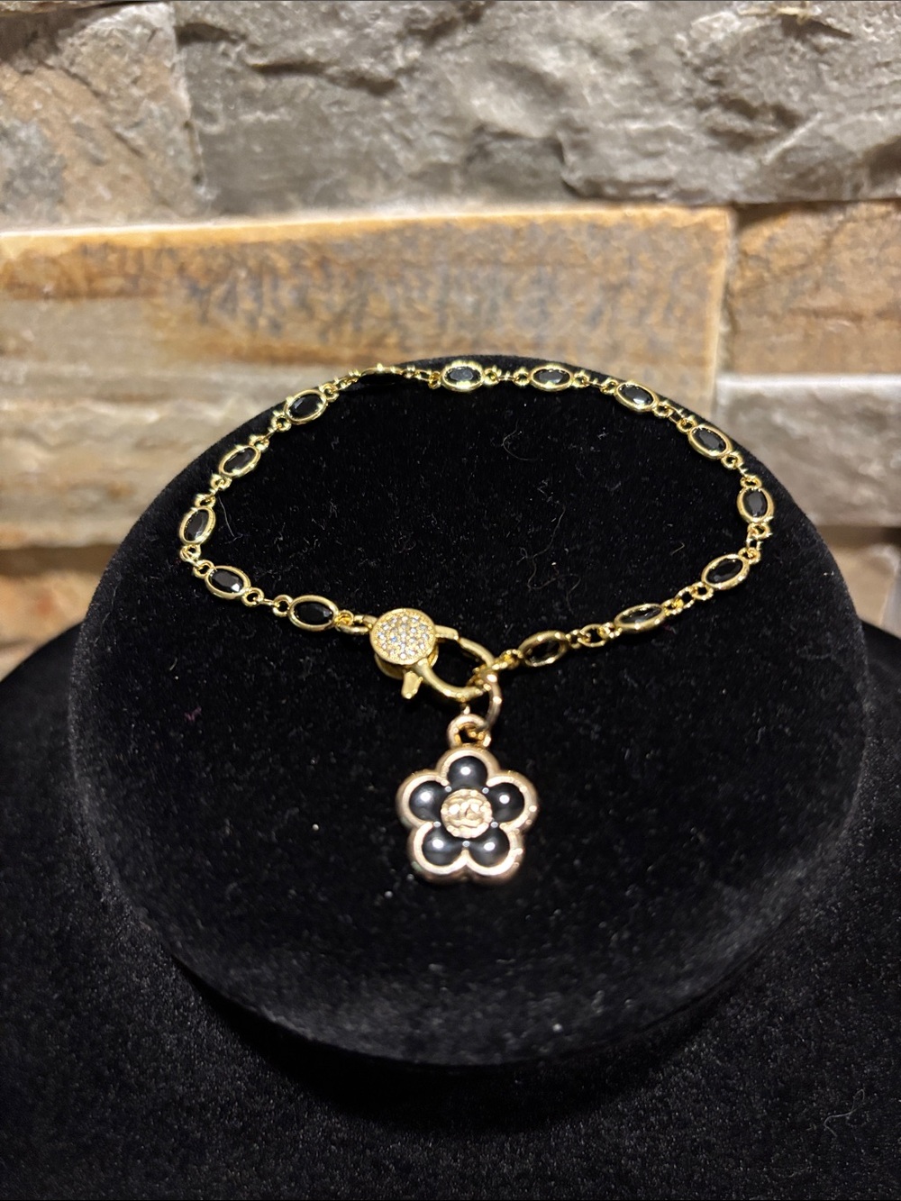 Gold Flower Charm Bracelet with Black Crystal stations